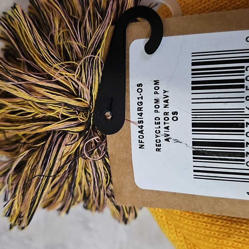 The North Face NWT Recycled Pom Pom Aviator Navy/Yellow Knit Beanie/ Unisex/OS - Picture 7 of 7